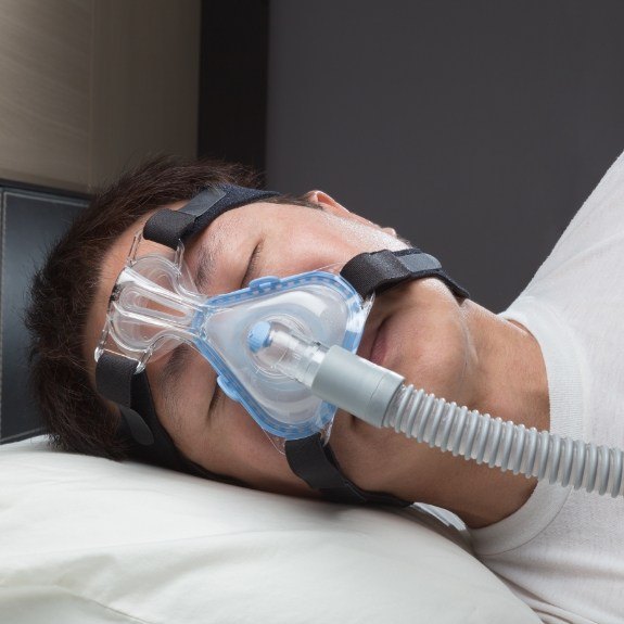 Dental patient sleeping soundly after sleep apnea treatment