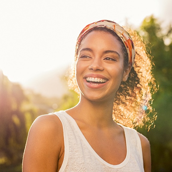 Woman smiling outside